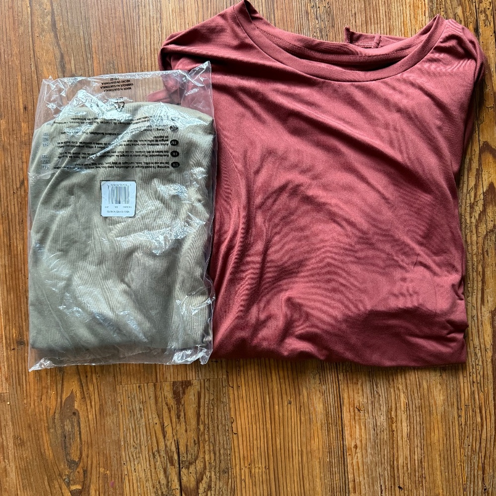 TWO men’s 2XL under armor shirts